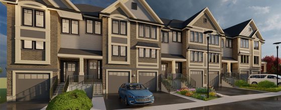 Row of modern townhouses with brick and siding exteriors, each with a garage and front steps; cars parked in driveways on a cloudy day.